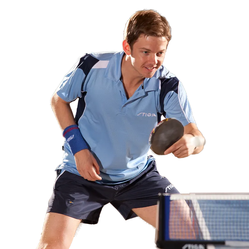 table tennis table with man playing ping pong. Family watching kids play outdoor table tennis. Stiga table tennis.