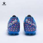 Back view of KELME Bolt Football Boots in blue with orange pattern on heel