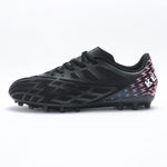 KELME Bolt Sr Football Boots in black, side view of single shoe