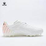 KELME Bolt Football Boots in white, side view of single shoe