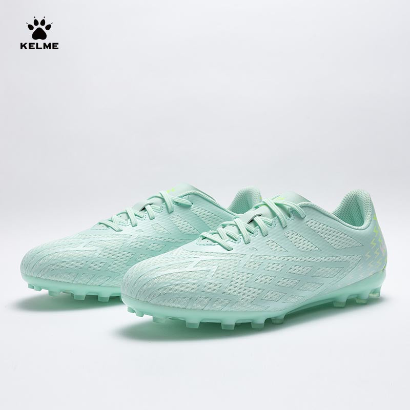 Pair of KELME Bolt Football Boots in mint green