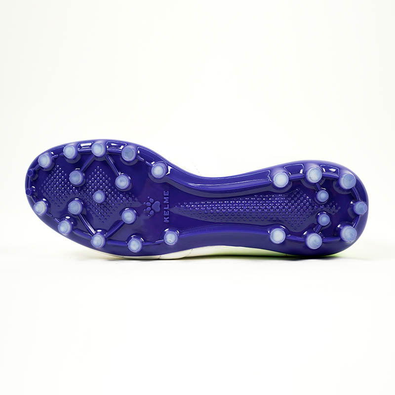 KELME Neo Sr Turf Boots for artificial surfaces - in black and white colour. View of underneath of shoe, royal blue sole.