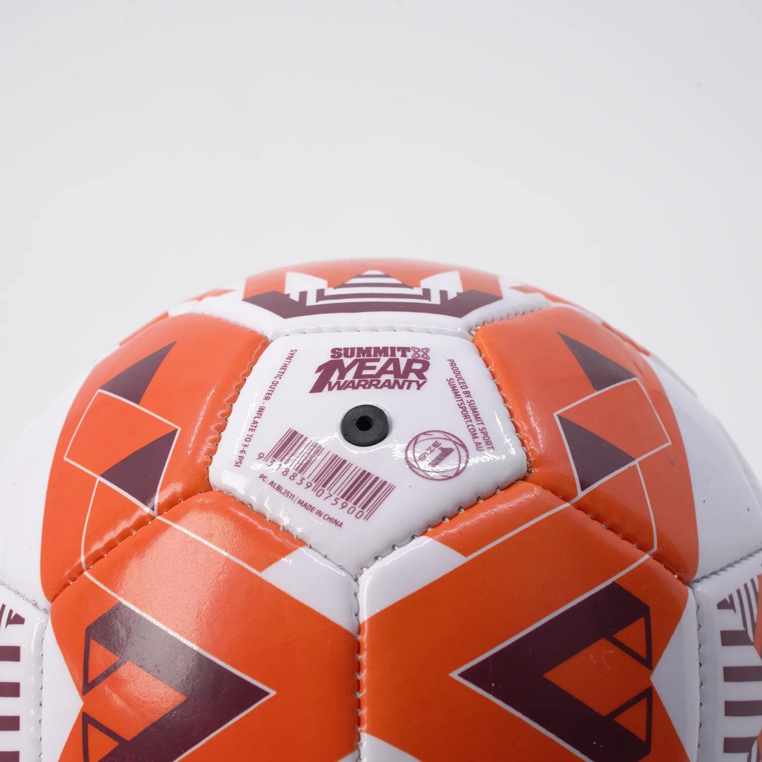Brisbane Roar Soccer ball size 1 skill in orange and white close up