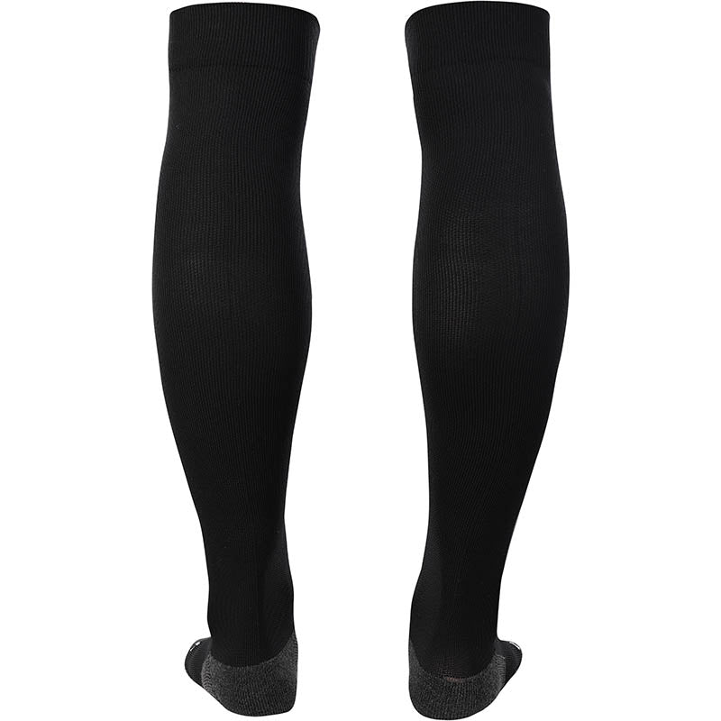 Non Slip grip socks by Kelme in black. Long socks for football in black colour from rear. 