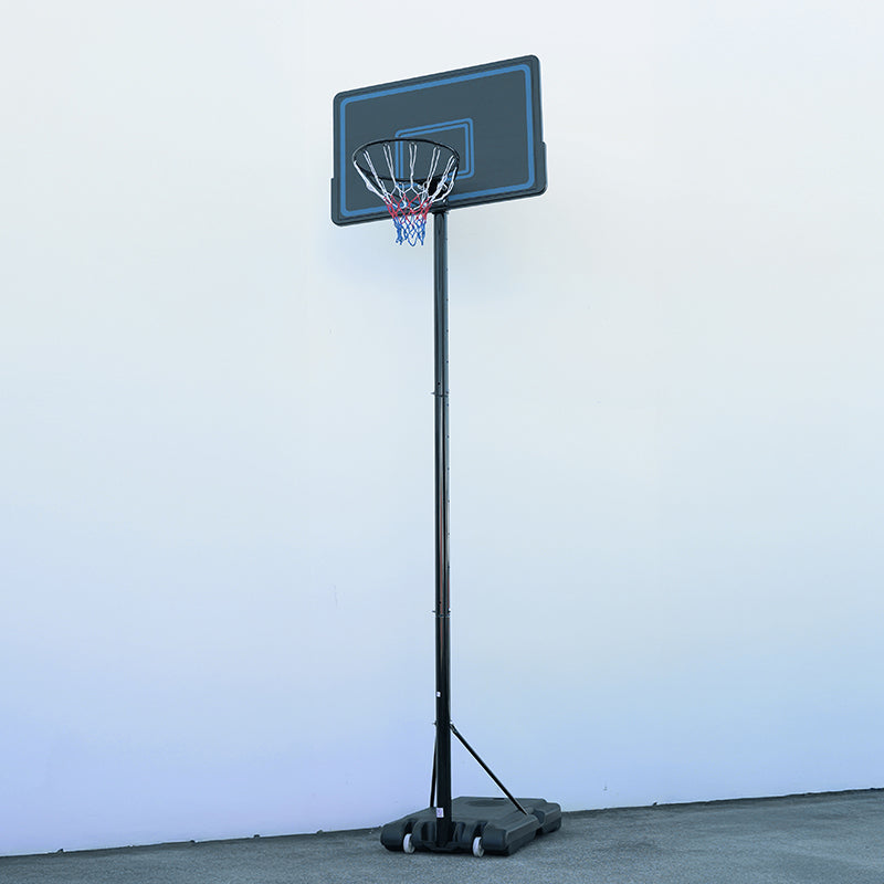 Basketball hoop with backboard on a stand against a light blue wall.