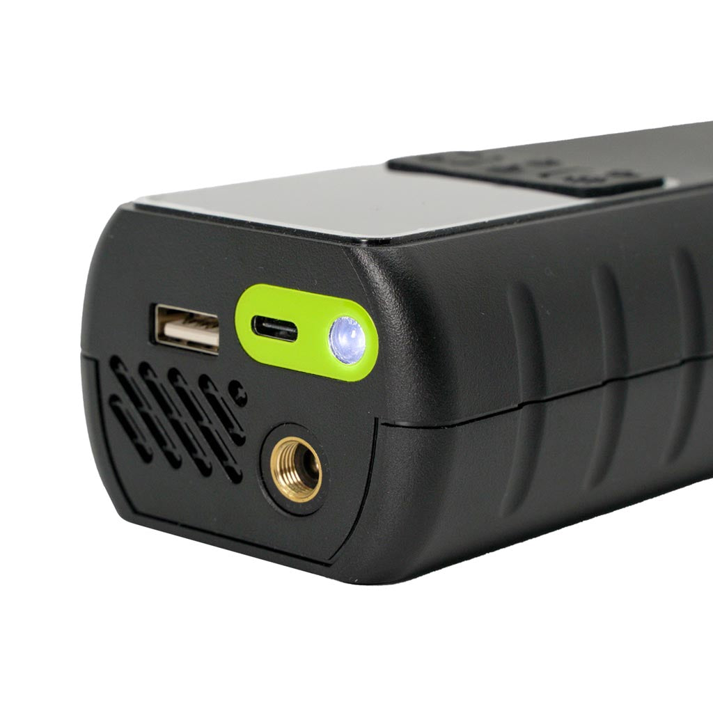 Electronic pump - close up of USB ports and needle insertion point on electric tyre pump. Has a flash light that can be used as a torch or flashing light for safety. USB power bank can charge mobile phones and small devices.