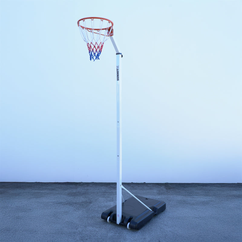 Netball ring system against a white wall.