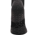 Black full length grip socks showing grip on base of sock to stop slipping in soccer boot.