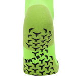 Fluro green full length grip socks showing grip on base of sock to stop slipping in soccer boot.