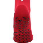 Red full length grip socks showing grip on base of sock to stop slipping in soccer boot.