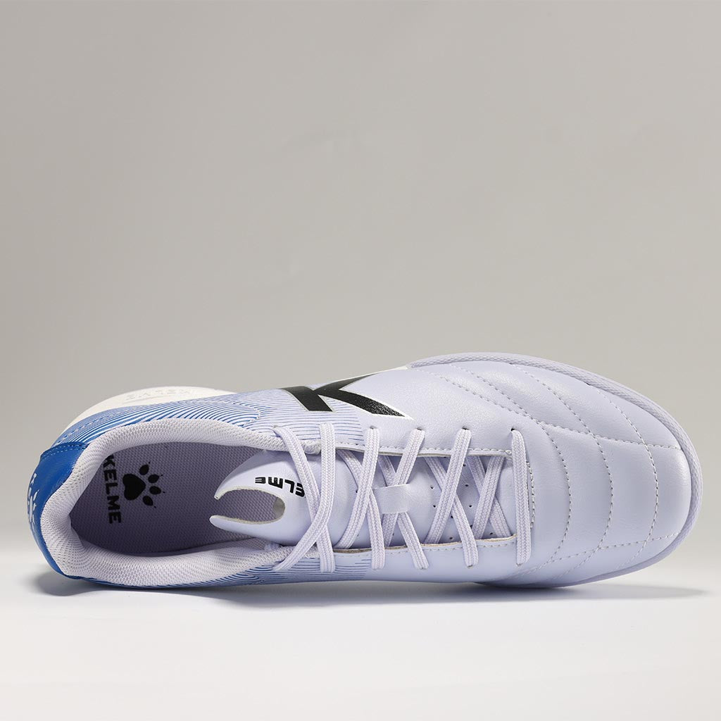 KELME Neo Sr Turf Boots for artificial surfaces - in grey and blue colour. Shot from above showing the inside of shoe