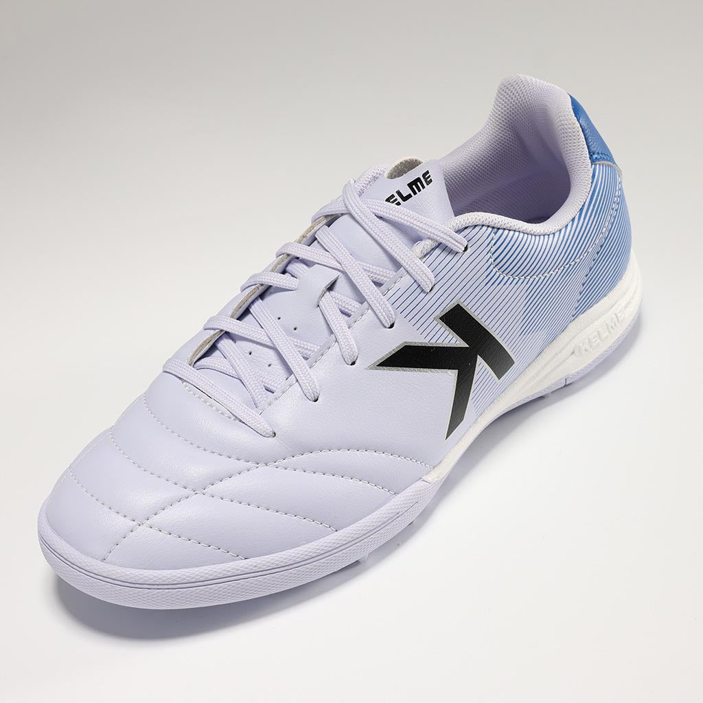 KELME Neo Sr Turf Boots for artificial surfaces - in grey and blue colour. Angle view of single shoe.