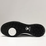 KELME Neo Sr Turf Boots for artificial surfaces - in black and white colour. View of studs on sole of shoe