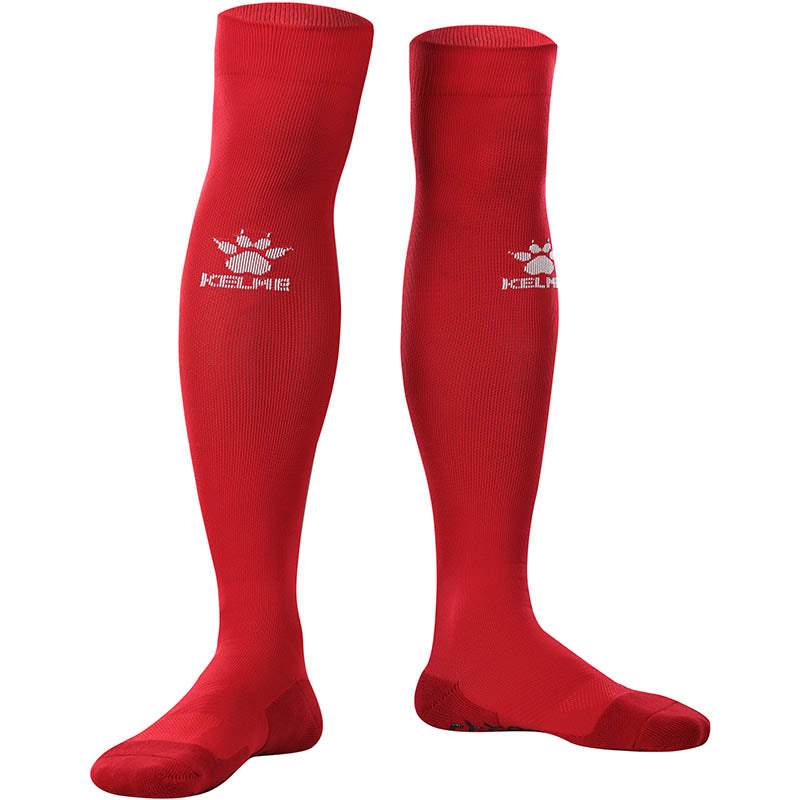 Kelme Football Grip Socks Red long front facing image. Football knee high grip socks for professional soccer players