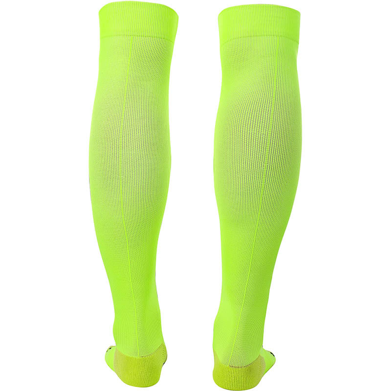 Kelme Football Grip Socks in fluro yellow from the rear. Football socks from back in bright yellow