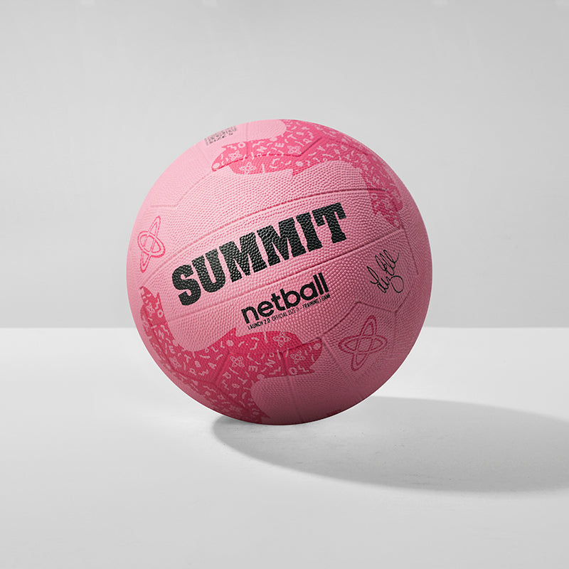 Pink netball with Summit branding and Liz Ellis signature on a light gray background