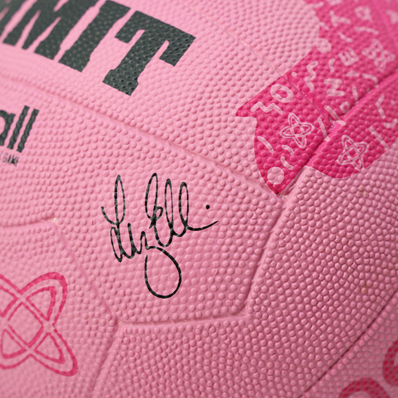 Close-up of a pink netball with Liz Ellis signature and branding