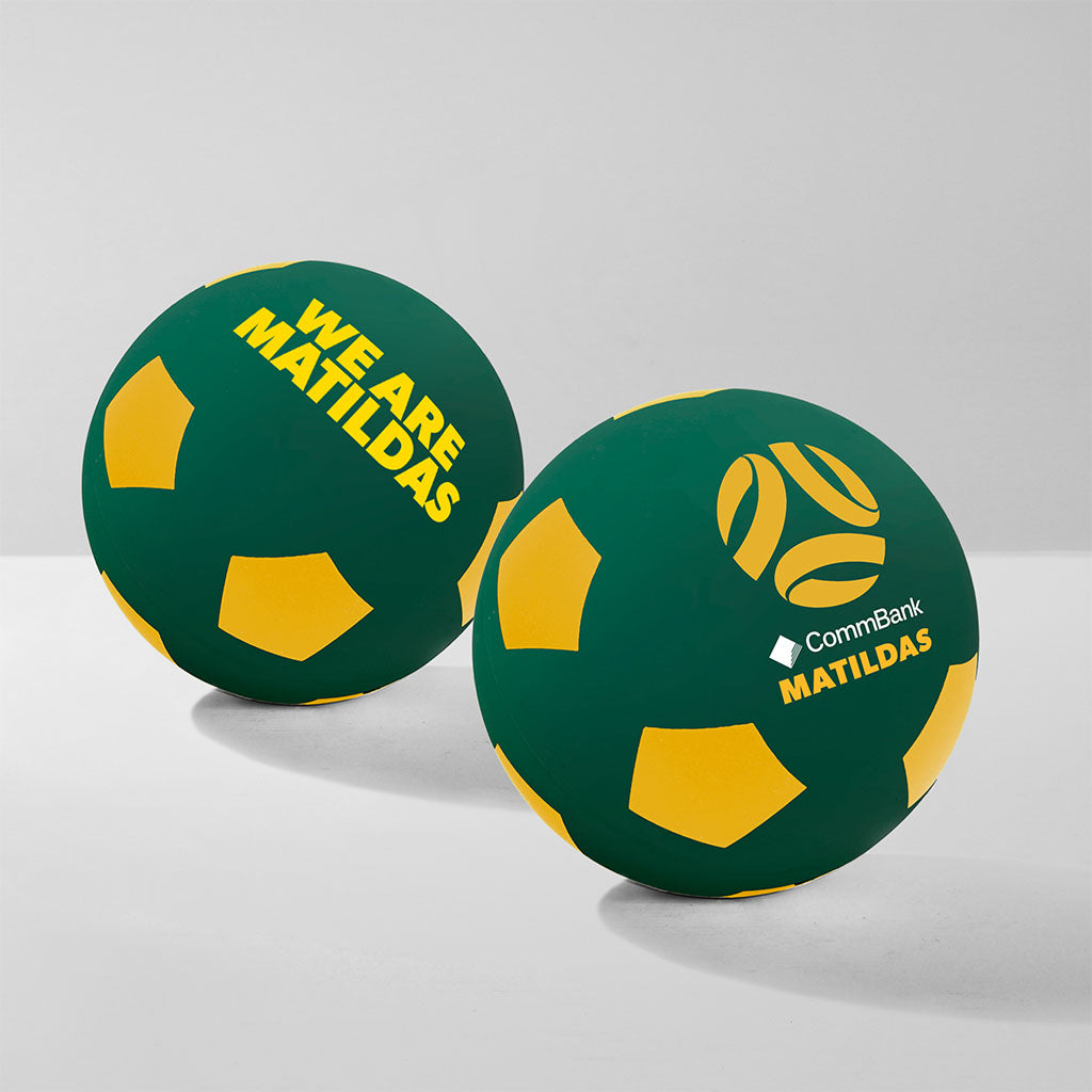 Two green and gold bounce balls with 'We Are Matildas' and 'CommBank Matildas' logos on a white background.