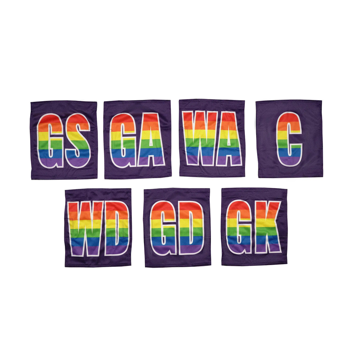 Netball dress team patches in a line with purple and rainbow printed positions