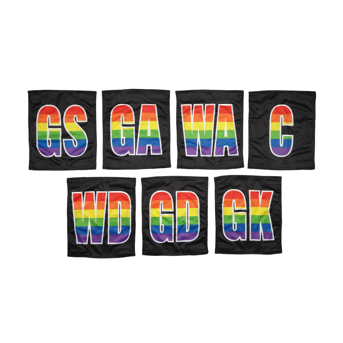 Netball dress team patches in a line with black and rainbow printed positions