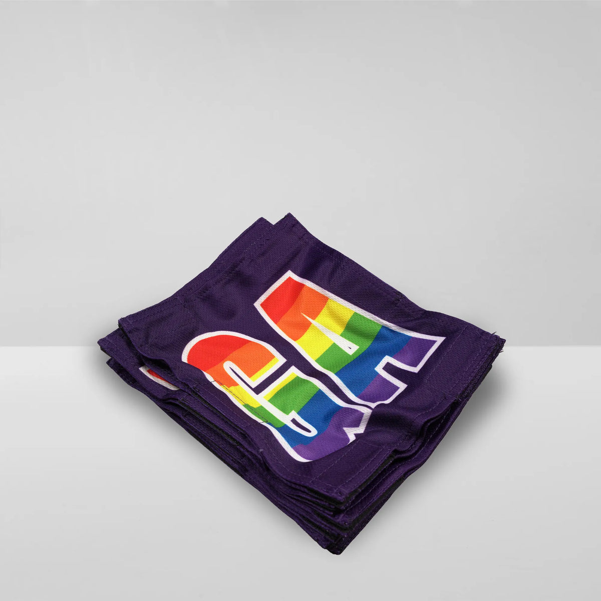 purple and rainbow team netball dress patches