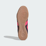 Close-up of a shoe sole with a textured pattern on a light gray background