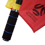 Textured foam grip for soccer sideline flag. For use with sidline referees.