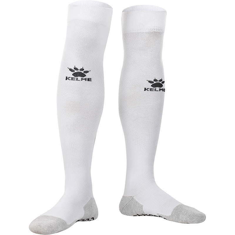 White grip socks used for soccer and football. Kneed high non slip sports socks. 