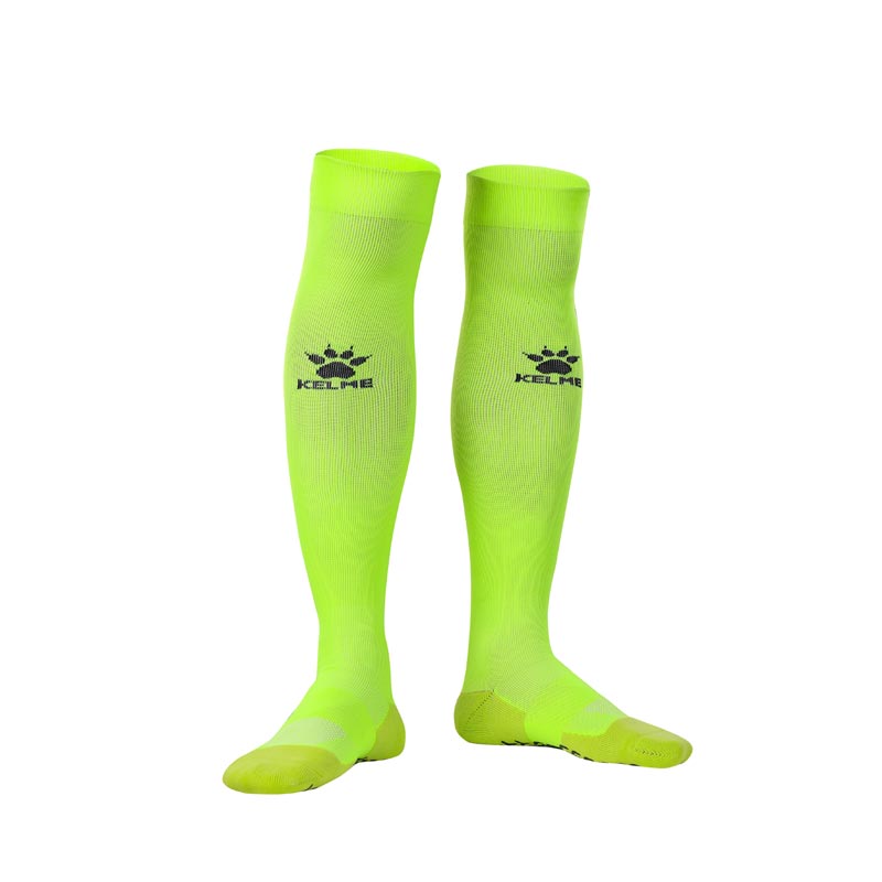 Kelme Football Grip Socks fluro yellow long. Football knee high grip socks for professional soccer players
