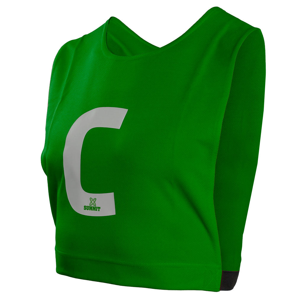 Green centre netball bib with elastic sides. Can be used for netball traiing. Netball bib fits kids and adult netballers.