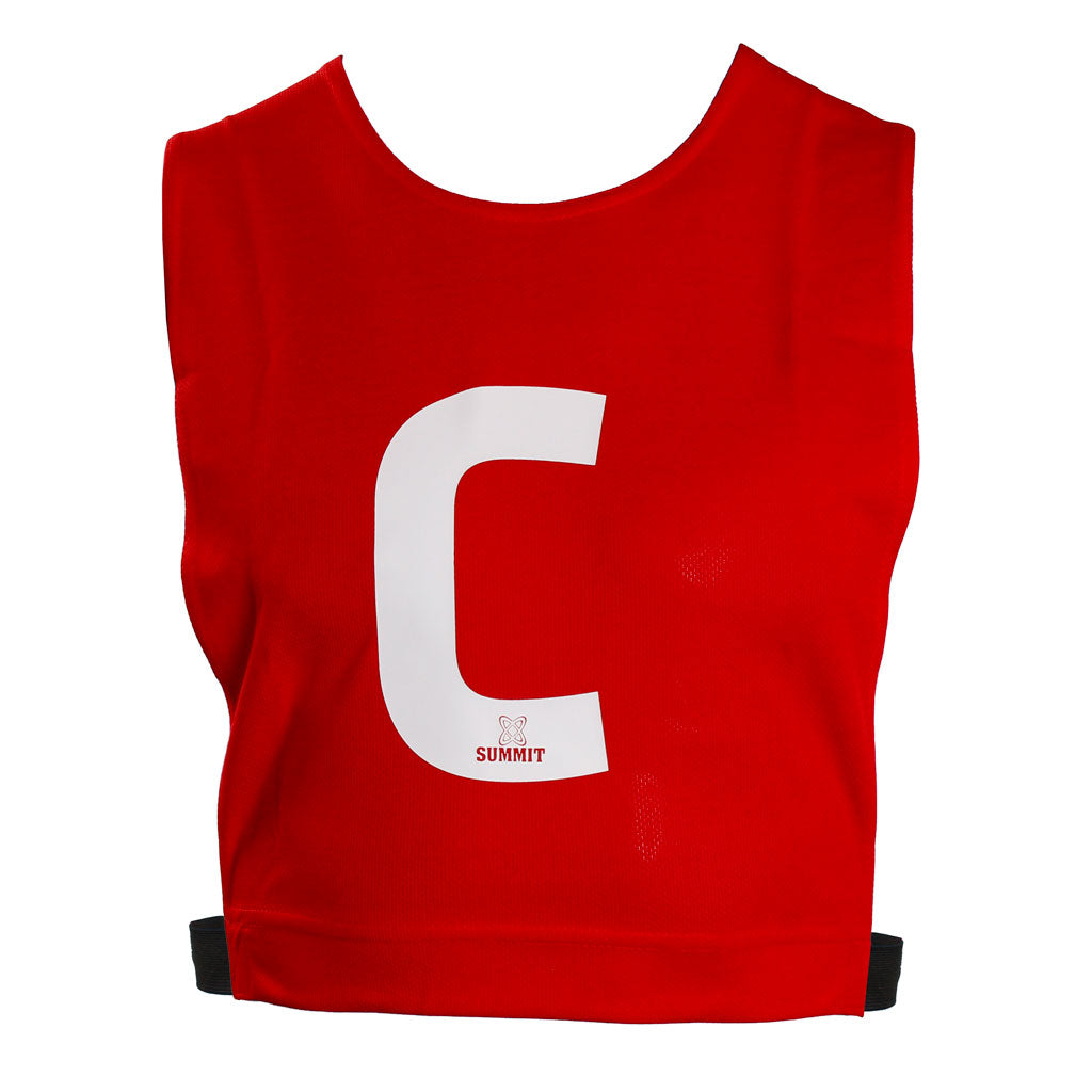 Red centre netball bib with elastic sides. Can be used for netball traiing. Netball bib fits kids and adult netballers.