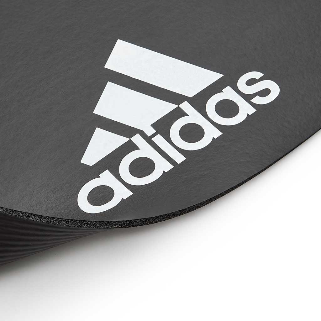 adidas 7mm fitness mats feature a large adidas logo at the base of the mat.